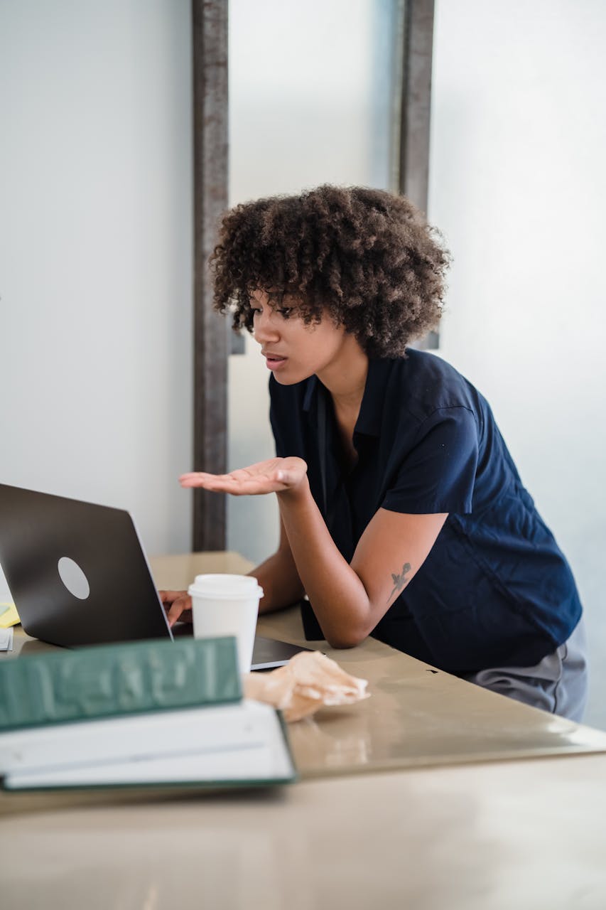 Focused woman participates in a remote video call conducting an adult ADHD assessment online