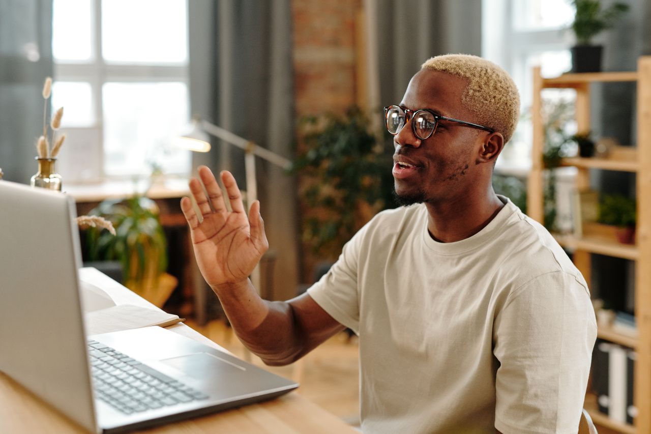 Adult participating in a virtual consultation from home